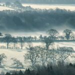 Sun rays breaking through the tress into a frosty Meon Valley. Featured as the January picture in the Meon Views calendar published by Studio 6, design and print, Wickham, Hampshire. All proceeds from the sale of this calendar go to Naomi House Childrens Hospice. If you are in (or passing) Wickham pop in and buy one or two!