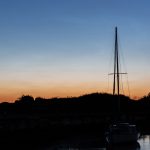 Pre dawn colours in the sky at Titchfield Haven. The comet Neowise is visible towards the top left